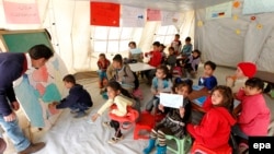 Sirijska deca u školi, Liban, 2015.