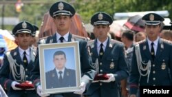 Armenia - The funeral in Yerevan of Yuri Tepanosian, an Armenian police officer killed in a standoff between security forces and opposition gunmen, 1Aug2016.