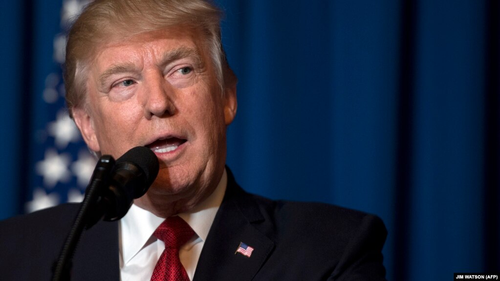 U.S. President Donald Trump delivers a statement late on July 6 in Florida announcing missile strikes against Syria in retaliation for a suspected chemical-weapons attack by regime forces.