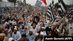 Activists and supporters of Islamic political party Jamiat Ulema-i-Islam (JUI) and other opposition parties in Islamabad on November 1.