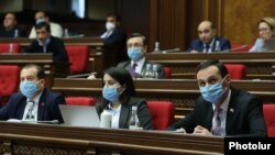 Armenia -- Deputies wear face masks during a parliament session in Yerevan, March 30, 2020.