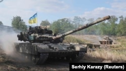 Ukrainian servicemen drive tanks during military exercises in the Donetsk region last month.