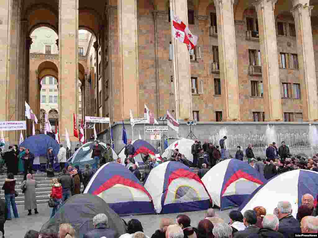 Georgia -- Opposition supporters hold a hunger strike in a makeshift tent camp near the parliament in central Tbilis, 12Mar2008 - In Georgia, opposition supporters used a hunger strike not to demand human rights, but to press for political concessions. Supporters of several opposition parties camped out near the parliament building in Tbilisi in March 2008, demanding changes to what they say are unfair electoral rules.