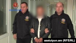 Georgia - A screenshot of official video of the arrest in Tbilisi of Robert Aghvanian, 27Mar2017.