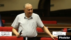 Armenia - Armen Charchian of the opposition Hayastan alliance arrives for a session of the Armenian parliament.