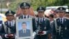 Armenia - The funeral in Yerevan of Yuri Tepanosian, an Armenian police officer killed in a standoff between security forces and opposition gunmen, 1Aug2016.