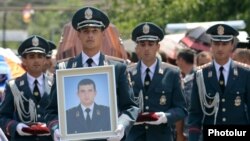 Armenia - The funeral in Yerevan of Yuri Tepanosian, an Armenian police officer killed in a standoff between security forces and opposition gunmen, 1Aug2016.