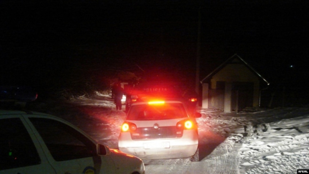 Bosnian police move into Gornja Maoca on February 2. Given the extent of the operation and the media frenzy that surrounded it, the results did not seem that impressive.