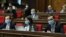 Armenia -- Deputies wear face masks during a parliament session in Yerevan, March 30, 2020.