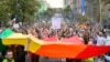 Participants march in the Belgrade Pride parade on September 18, 2021.