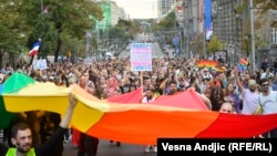 Participants march in the Belgrade Pride parade on September 18, 2021.