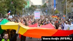 Participants march in the Belgrade Pride parade on September 18, 2021.