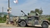 Members of the KFOR peacekeeping force patrol an area near Kosovo's border with Serbia. (file photo)