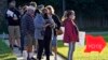 U.S. -- Election 2020 Florida -- People wear protective face masks as they wait in line to vote at the Bell Shoals Baptist Church on election day Tuesday, Nov. 3, 2020, in Brandon, Fla. (AP Photo/Chris O'Meara)