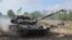 Ukrainian servicemen drive tanks during military exercises in the Donetsk region last month.
