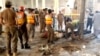 Pakistan - Security forces cordoned off a religious school in Peshawar, northwest Pakistan, after a deadly bombing tore through the building. October 27 screen grab