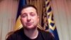 Ukrainian President Volodymyr Zelenskiy attends a video conference with governmental officials from a hospital where he has been hospitalized with coronavirus symptoms, in Kyiv on November 12.