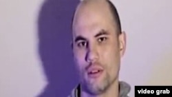 Сергей Ашимов, показанный казнённым на пропагандистском видео экстремистской организации «Исламское государство». Кадр из этого видео. 