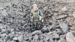 Воронка від російського снаряда. 