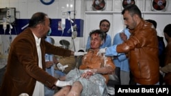 A man injured in a bomb explosion is treated at a hospital in Quetta, Balochistan on January 7.