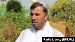 FILE: Kandahar police chief General Abdul Raziq was not at home and was unhurt.