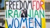 A poster held during a march in Paris on September 15, one day before the second anniversary of the death in police custody of Mahsa Amini, which sparked a protest movement in Iran.