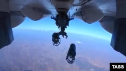 A Russian Su-30 fighter drops bombs over Syria on October 15.