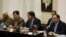Afghanistan's Foreign Minister Salahuddin Rabbani, right, speaks at a one-day meeting with Pakistani, U.S., and Chinese delegations in Kabul in February as part of attempts to broker peace talks with the Taliban.