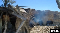 Buildings destroyed in earlier fighting in Helmand Province (file photo)