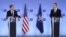 U.S. Secretary of State Antony Blinken (left) and NATO Secretary-General Jens Stoltenberg deliver remarks at NATO headquarters in Brussels on March 23.