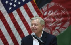 U.S. Senator Lindsey Graham speaks during a press conference at the Resolute Support headquarters in Kabul on December 16.