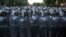 Armenia -- Police block a street during a protest against an increase of electricity prices in Yerevan, June 23, 2015