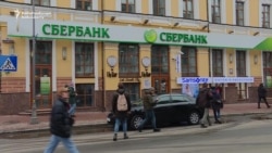 Kyiv Demonstrators Attack Institutions Linked To Russia