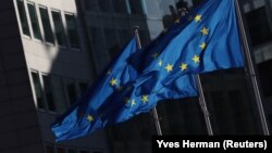 BELGIUM -- European Flags flutter outside the EU Commission headquarters ahead of the European Union leaders summit, in Brussels, October 17, 2019