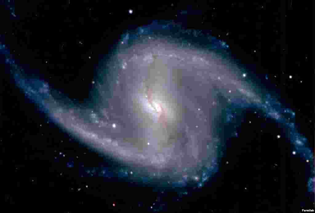 This is one of the first images recorded by the Dark Energy Camera, the world&#39;s most-powerful digital camera. Built at Fermilab, a U.S.-run facility near Chicago, and mounted on a telescope at an observatory in Chile, the camera achieved first light on September 12.