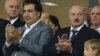 Then-Georgian President Mikheil Saakashvili (left) and Belarusian counterpart Alyaksandr Lukashenka attend the UEFA EURO 2012 final in Kyiv in July 2012.