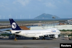 An Iran Air Boeing 747-200 aircraft is parked at a cargo apron at Macau International Airport in China on August 24.