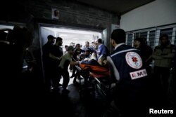 Palestinienii răniți la spitalul Al-Ahli au primit asistență medicală la spitalul Shifa, aflat în apropiere.