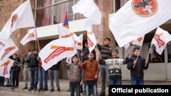 Armenia - Children wave the ruling Republican Party's flags at an election campaign rally in Aragatsotn province, 20Mar2017.
