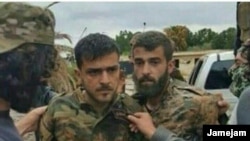 A photo allegedly showing Islamic Revolutionary Guards Corps members in Syria captured by opposition forces.