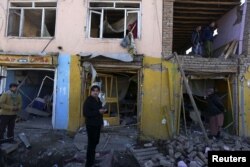 У вибухах при нападі на приміщення дорожньої поліції в Кабулі потерпіли і сусідні будинки, 21 січня 2013 року