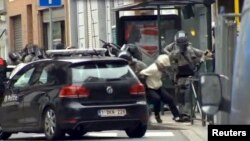 Брюссель маңында Салех Абдесламды тұтқындау сәті. Бельгия, 18 наурыз 2016 жыл.