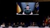 Ілюстрацыйнае фота. Прэзыдэнт Украіны Ўладзімір Зяленскі (на экране) выступае зь відэазваротам на саміце NATO. Мадрыд, 29 чэрвеня 2022 году