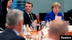 Samit u Berlinu sazvan je na inicijativu njemačke kancelarke Angele Merkel i francuskog predsjednika Emanuela Makrona