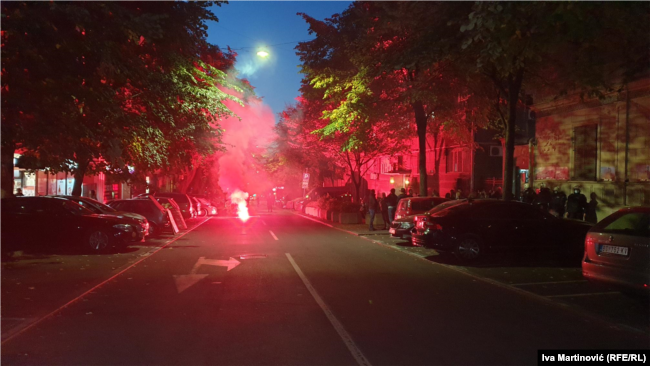 A pyrotechnic tool has been thrown by protesters in Belgrade who are opposing holding the festival