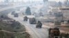 A Turkish military convoy driving through Syria's northwestern Idlib province, February 15, 2018.