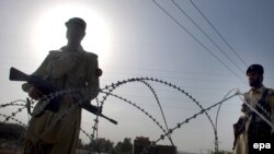 Pakistani troops at a checkpoint in the Khyber region in late June