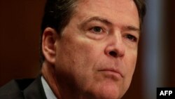 U.S. Democrats are blasting FBI Director James Comey for refusing to join other top government officials in naming Russia as the hacking power behind e-mail leaks.