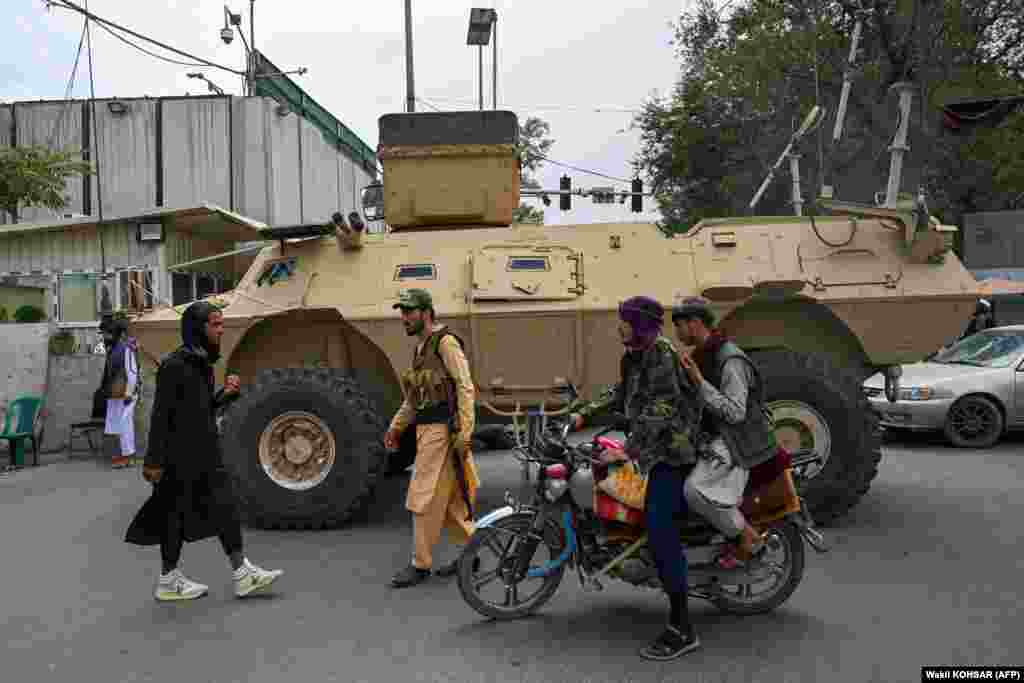 Taliban fighters patrol the streets of Kabul.