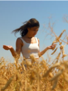 Moldova, Farmer Cristina Bejereanu in a wheat field, wheat